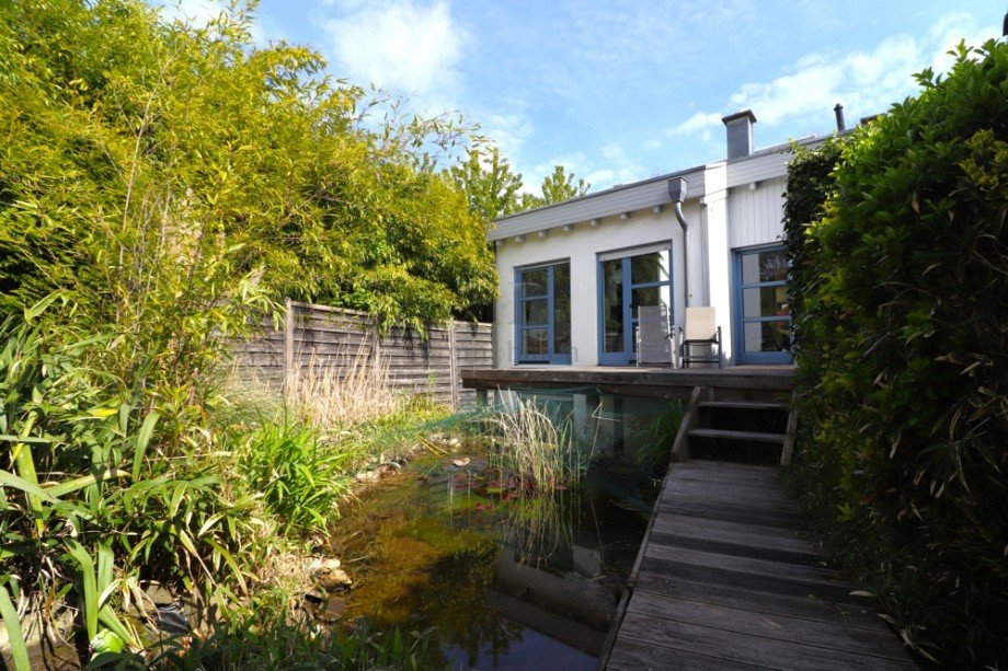 Terrassenansicht + Teich Reihenendhaus Dinslaken
