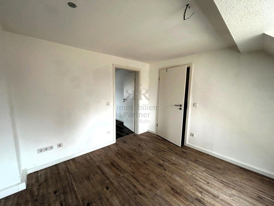 Ausgefallene Dachgeschosswohnung in Gelsenkirchen-Bismarck - Foto 1